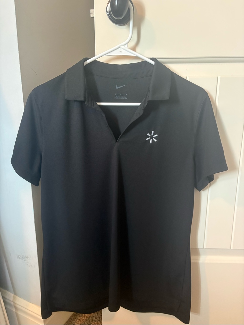 Nike Black Women’s Polo with White Embroidered Starburst